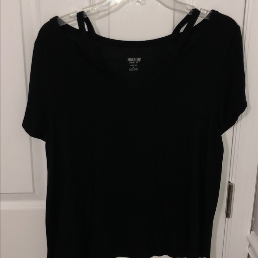 Black tee the hangs off the shoulders